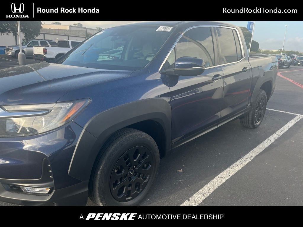 Used 2023 Obsidian Blue Pearl Honda RTL image 1
