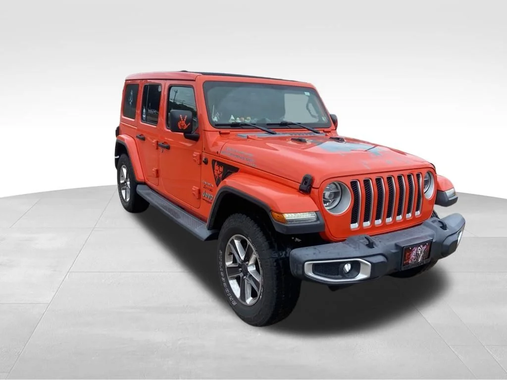 Used 2019 Orange Jeep Unlimited Sahara image 7