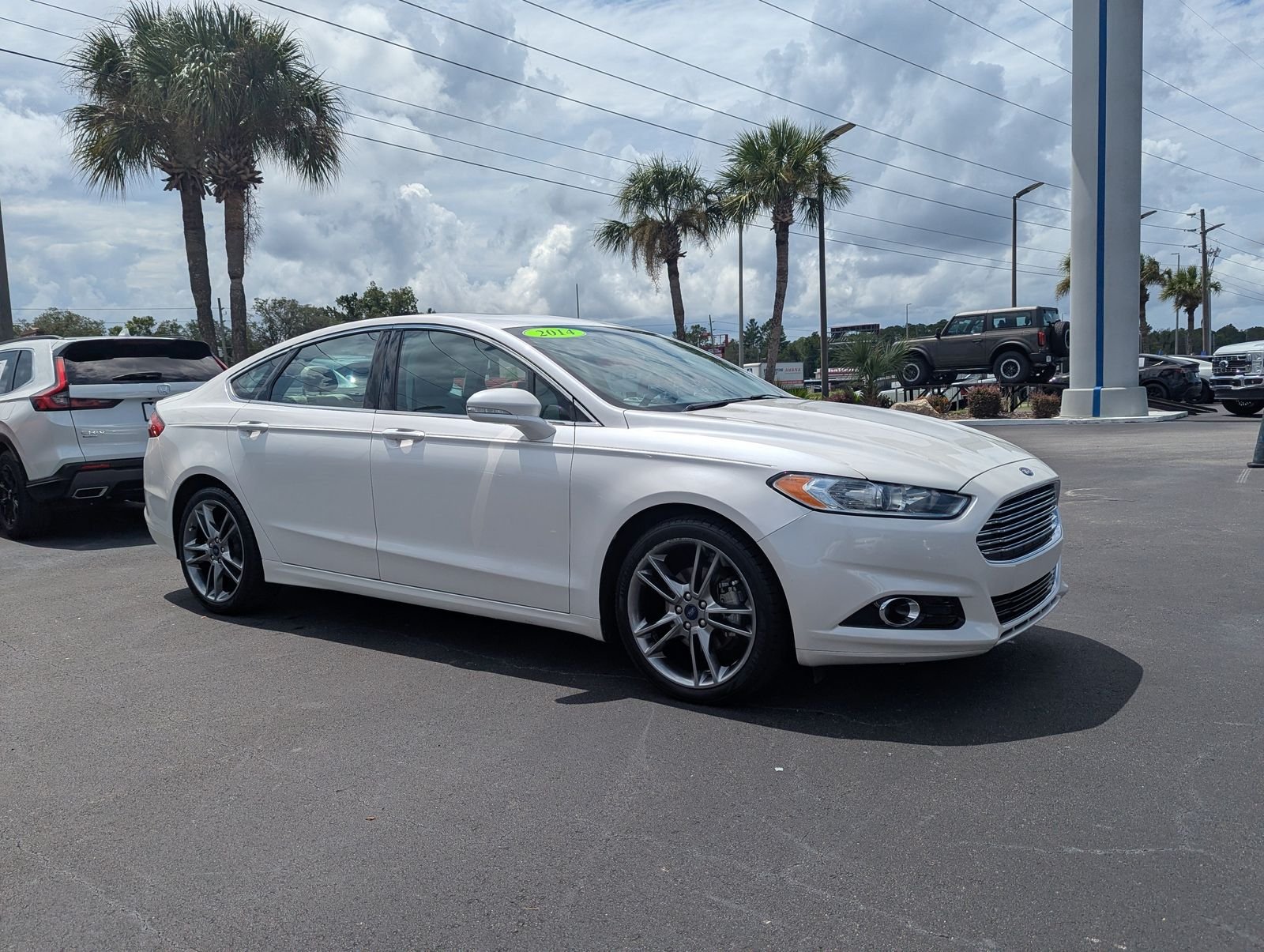 Used 2014 Ford Fusion Titanium with VIN 3FA6P0K98ER335487 for sale in Spring Hill, FL