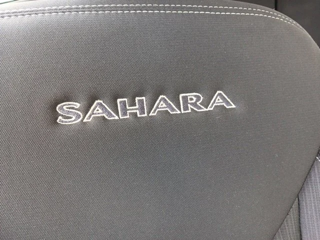 Used 2018 White Jeep Unlimited Sahara image 32