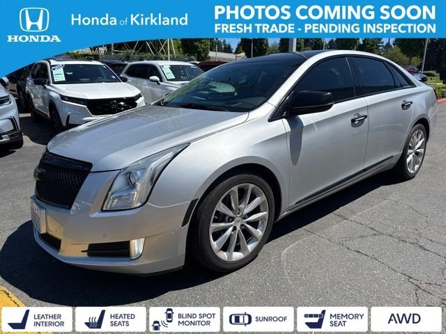 Used 2014 Radiant Silver Metallic Cadillac Premium image 1