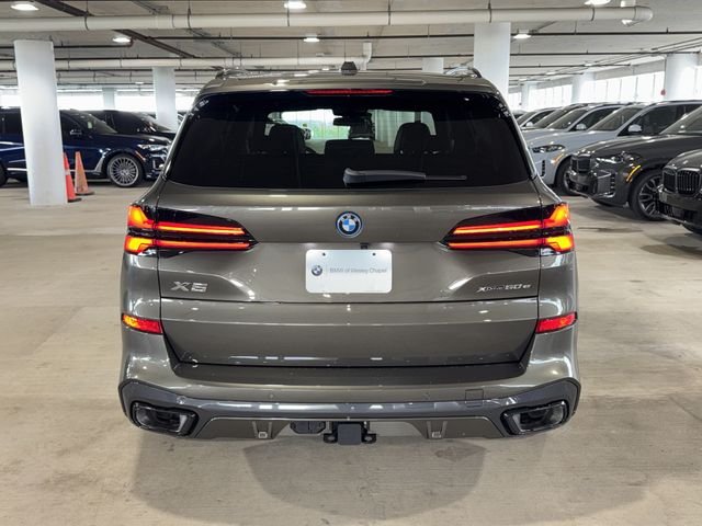 New 2026 Manhattan Green Metallic BMW xDrive50e image 6
