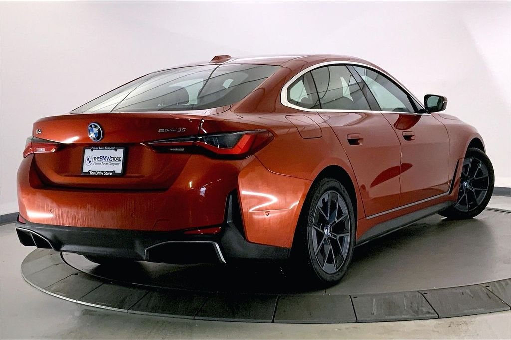 Used 2023 Sunset Orange Metallic BMW  image 11