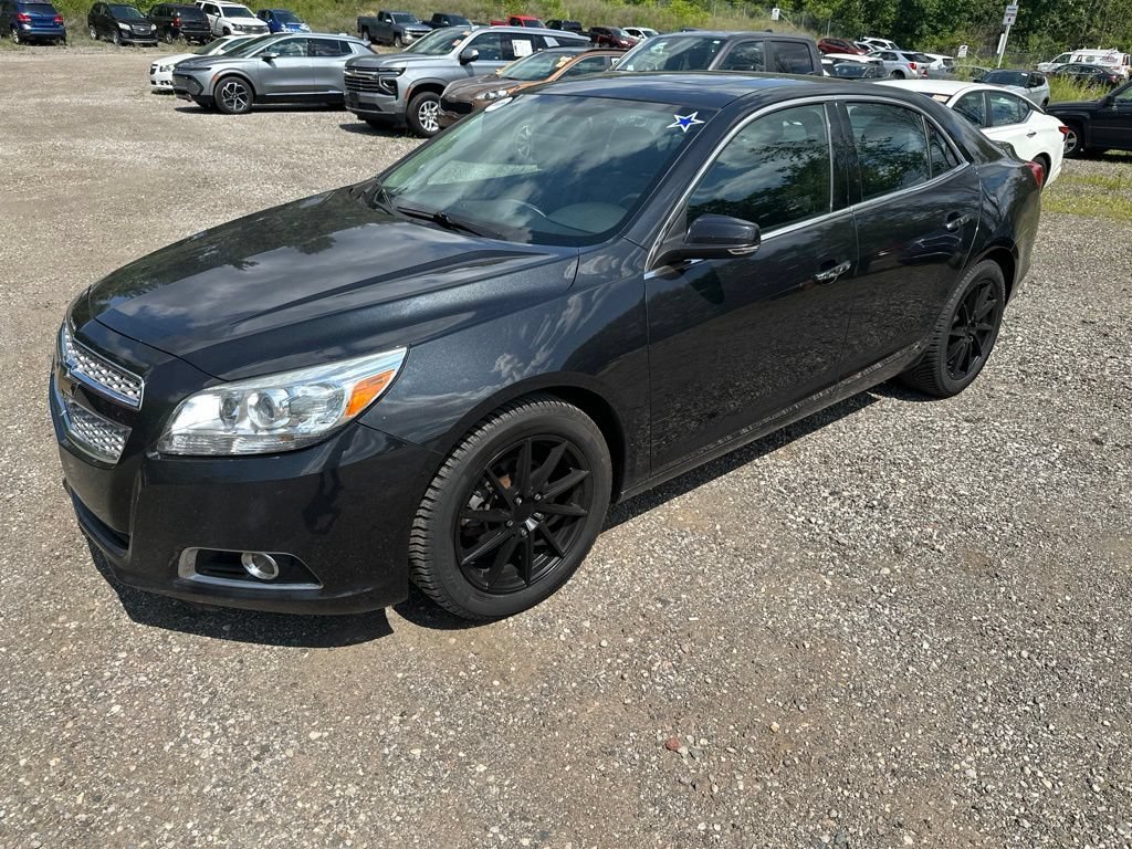 Used 2013 BLACK GRANITE METALLIC Chevrolet LTZ image 1