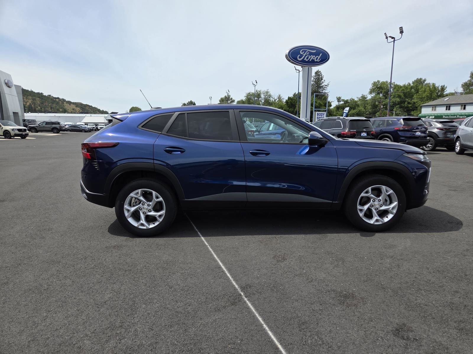 Used 2024 Blue Glow Metallic Chevrolet LS image 4