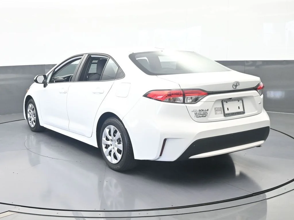 Used 2021 Super White Toyota LE image 3