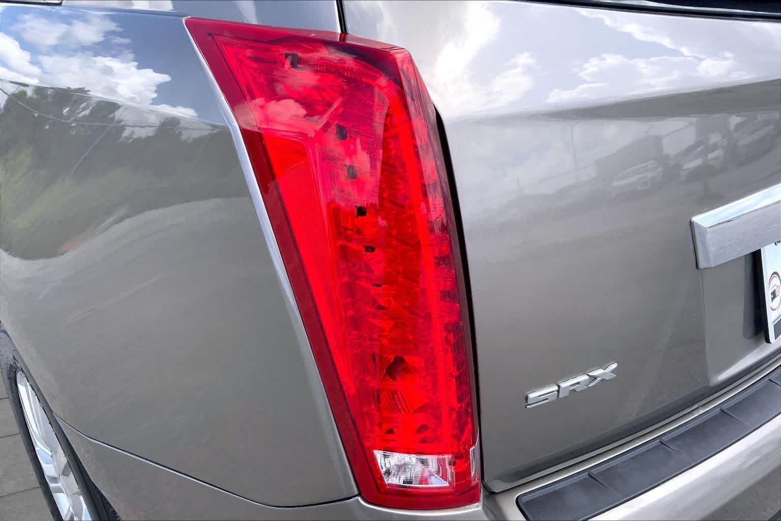 Used 2012 Mocha Steel Metallic Cadillac Luxury Collection image 28