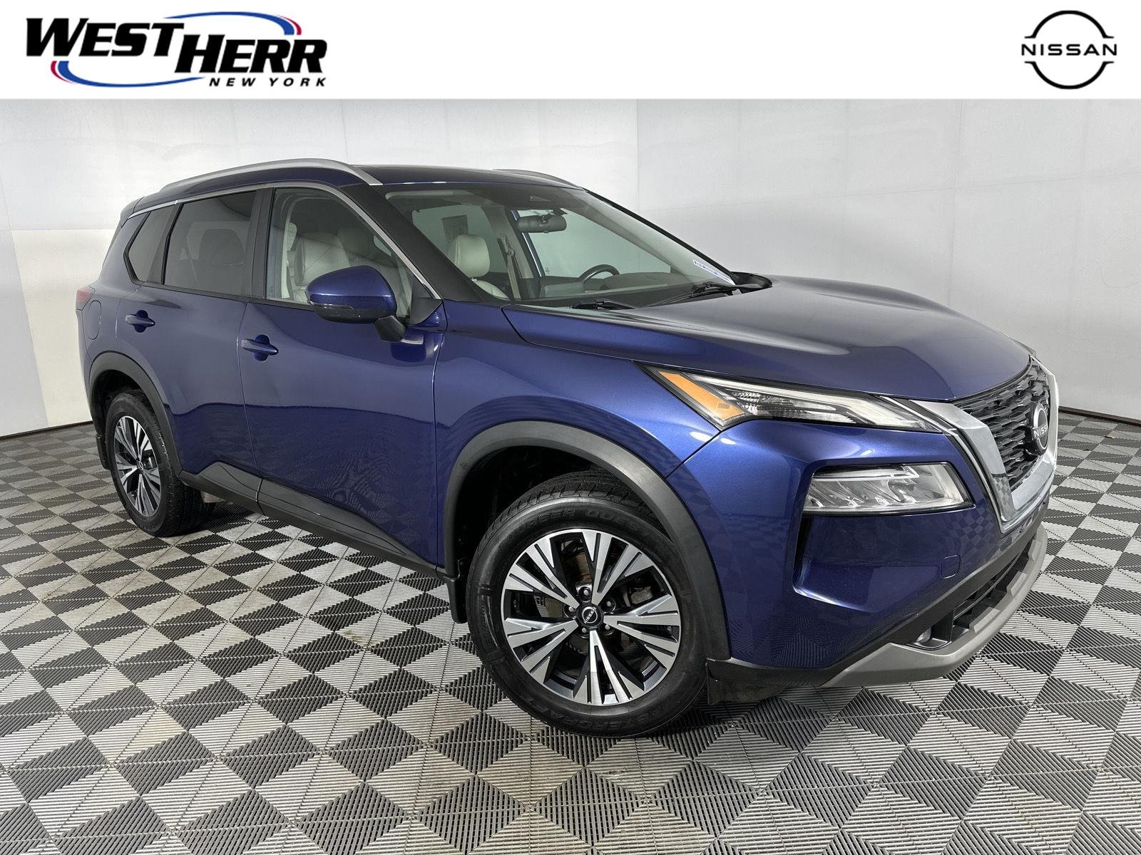 Used 2022 Caspian Blue Metallic Nissan SV image 1