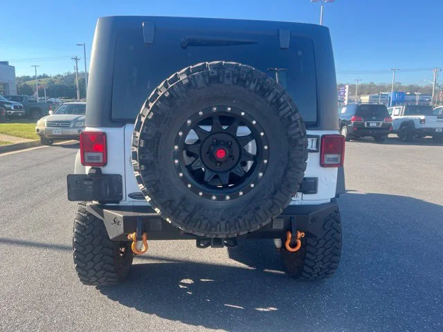 Used 2018 White Jeep Unlimited Sport image 4