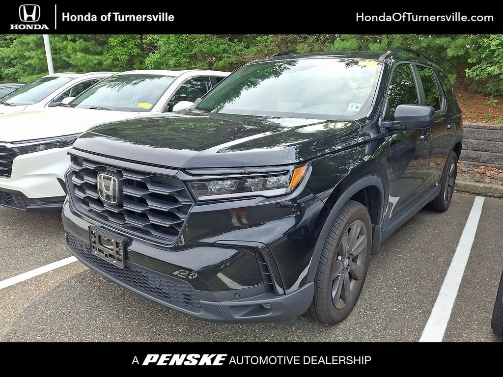 Certified Used 2025 Crystal Black Pearl Honda AWD Sport image 1