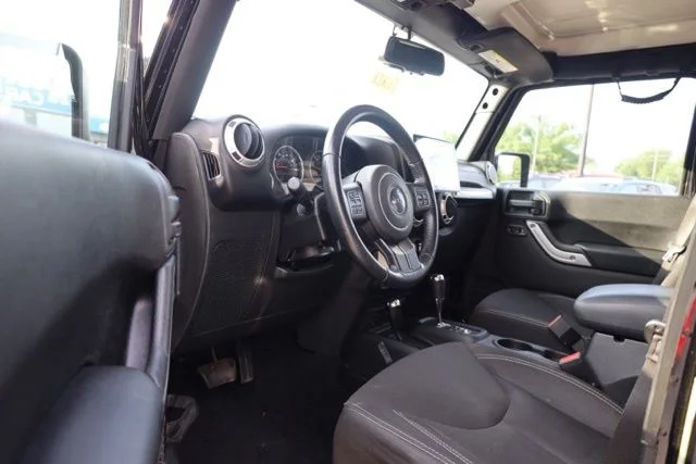 Used 2017 Black Jeep Unlimited Sahara image 15