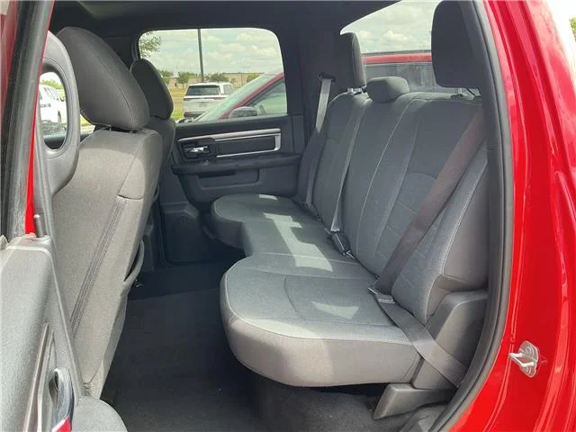 Used 2024 Flame Red Clearcoat RAM SLT 4x4 Crew Cab 5.6 ft. box 140 in. WB image 12