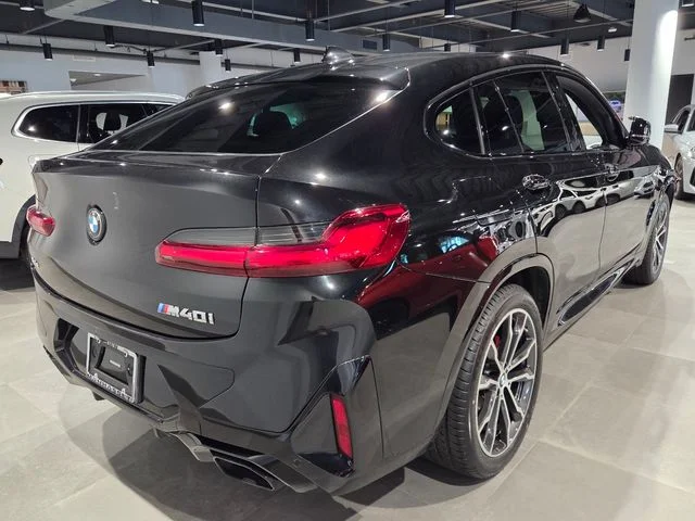 Used 2023 Black Sapphire Metallic BMW M40i image 4
