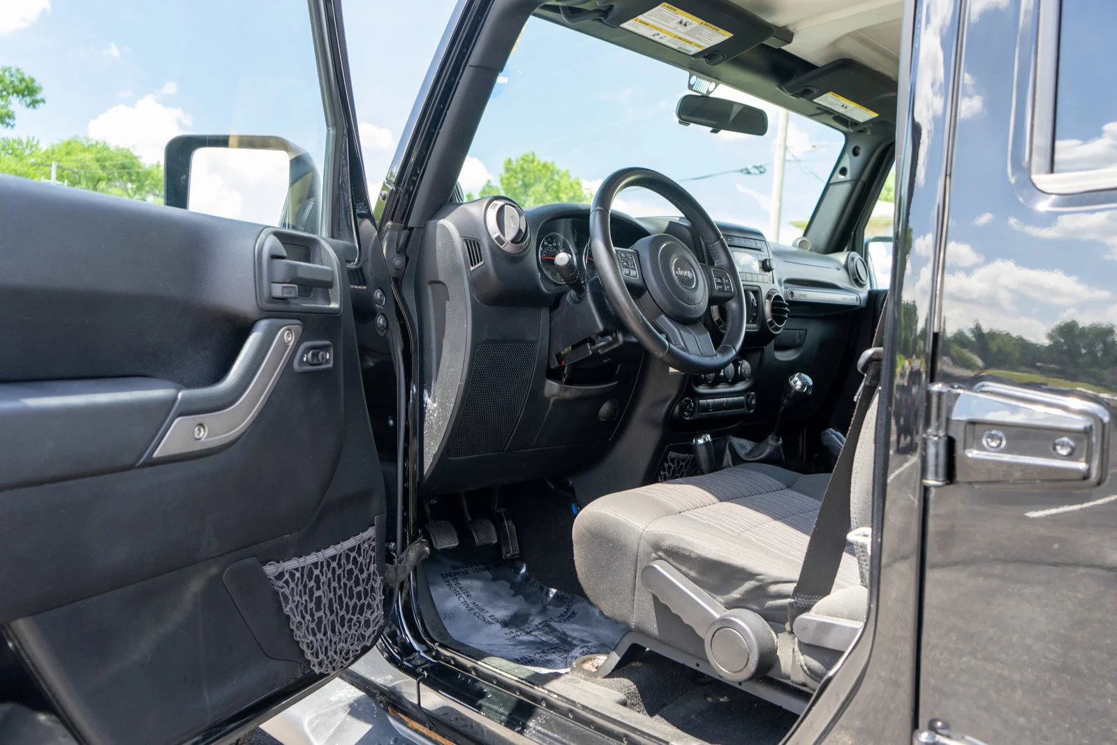 Used 2012 Black Clearcoat Jeep Unlimited Sport image 13