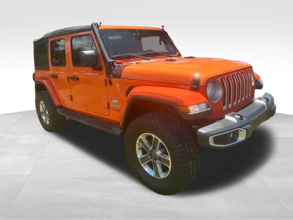 Used 2018 Orange Jeep Unlimited Sahara image 30