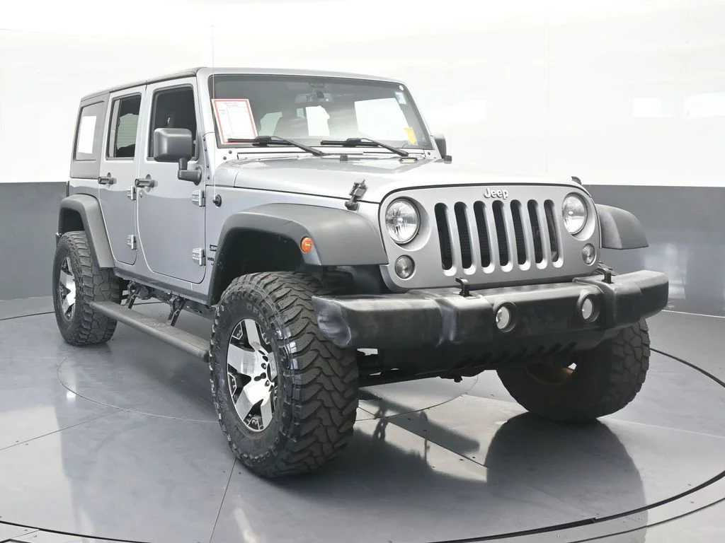 Used 2016 Billet Silver Metallic Clearcoat Jeep Unlimited Sport image 4