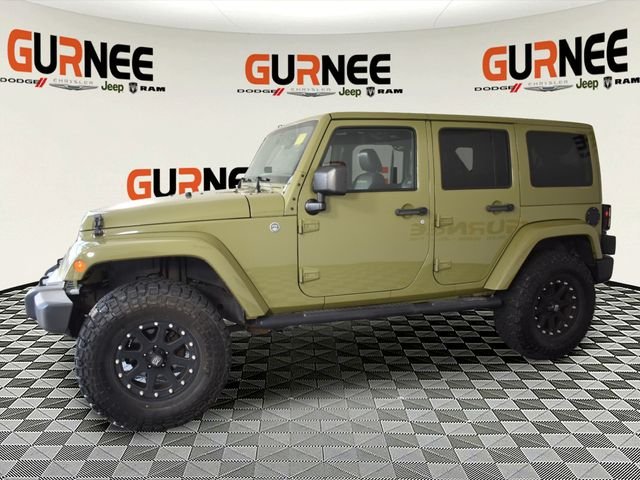 Used 2013 Green Jeep Unlimited Sahara image 4