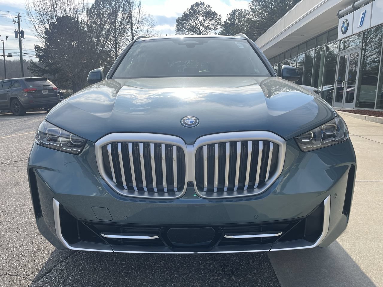 Used 2026 Blue Ridge Mountain Metallic BMW xDrive50e image 10