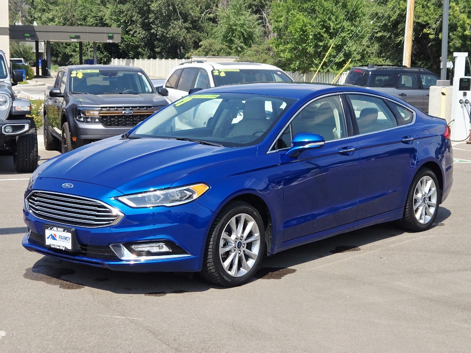 Used 2017 Lightning Blue Ford SE image 1