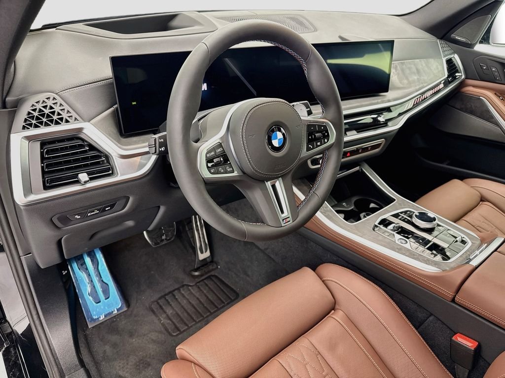 New 2026 Black Sapphire Metallic BMW M60i image 9