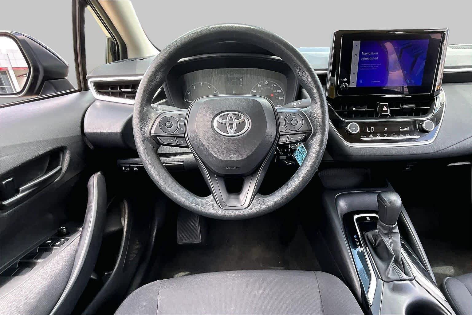 Used 2024 Midnight Black Metallic Toyota LE image 6