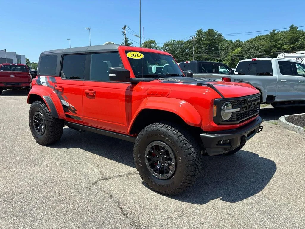 Used 2023 Orange Ford Raptor image 1