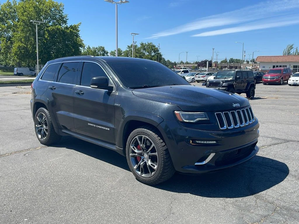 Used 2014 Brilliant Black Crystal Pearlcoat Jeep SRT8 image 1