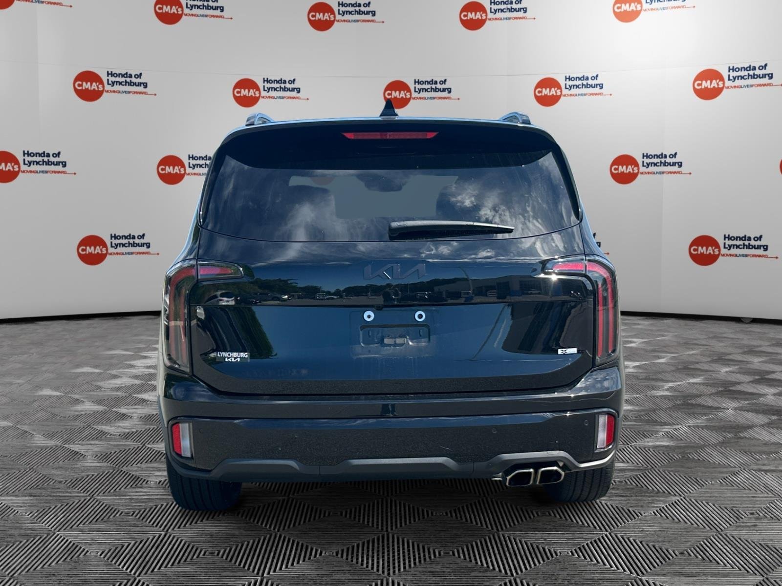 Used 2025 Ebony Black Kia EX X-Line image 4