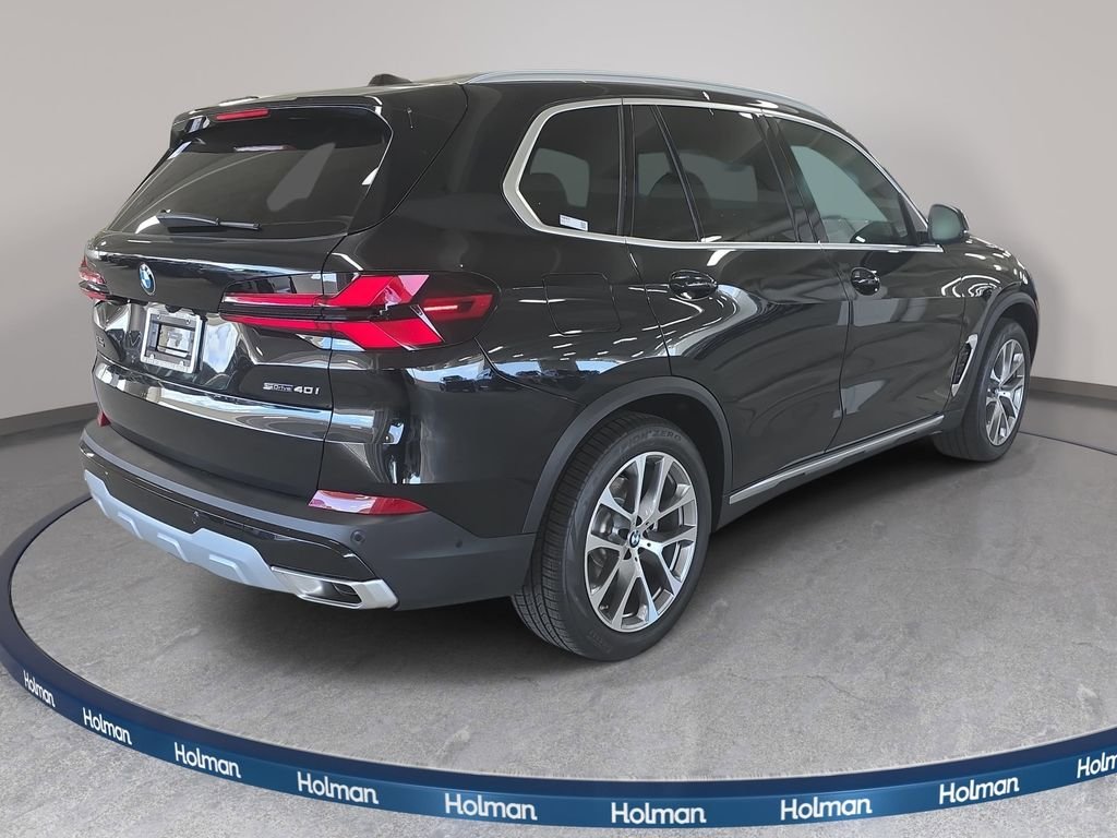 New 2026 Black Sapphire Metallic BMW sDrive40i image 4