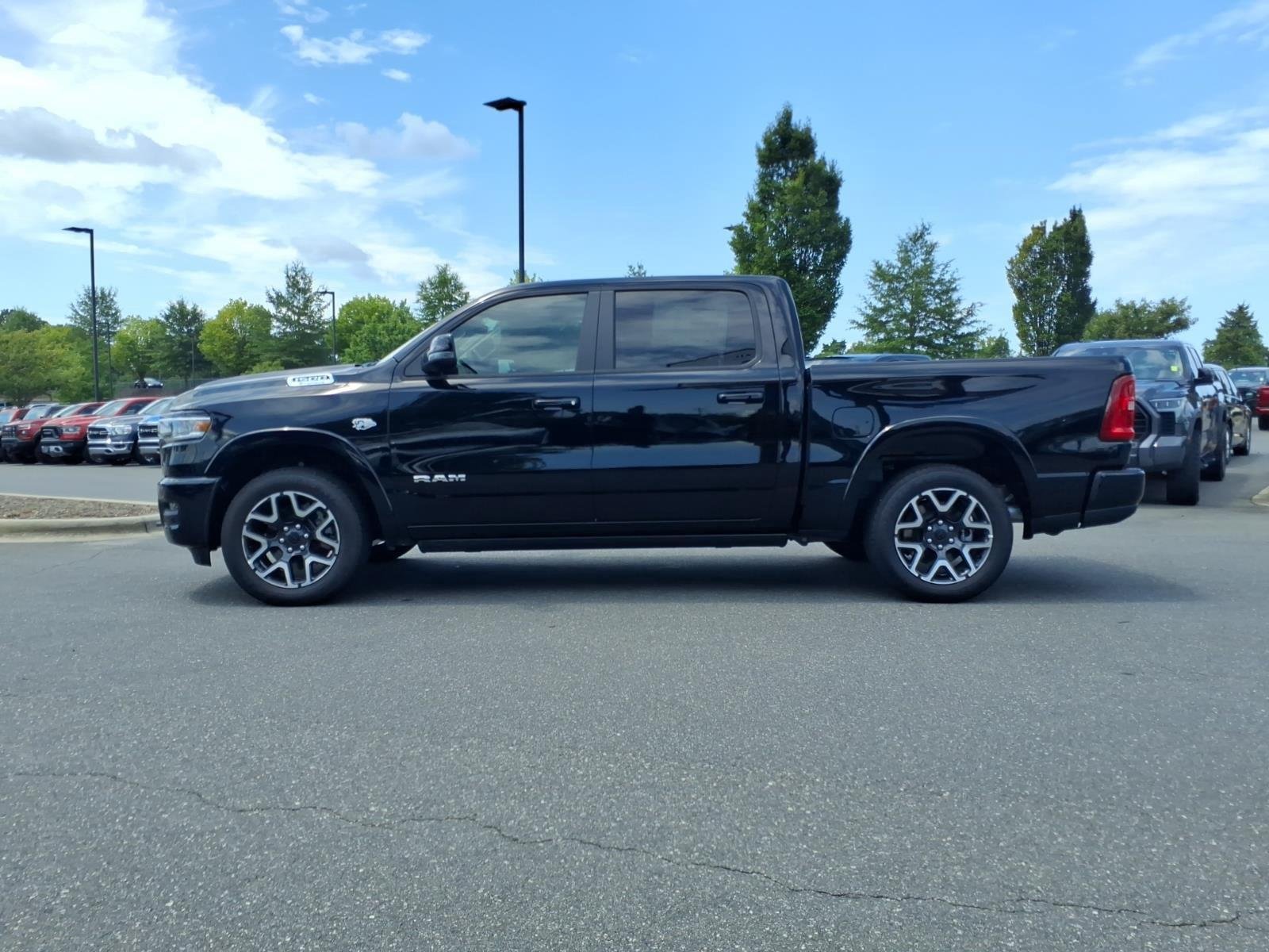 New 2026 Diamond Black Crystal Pearl-Coat Exterior Paint RAM Laramie image 3
