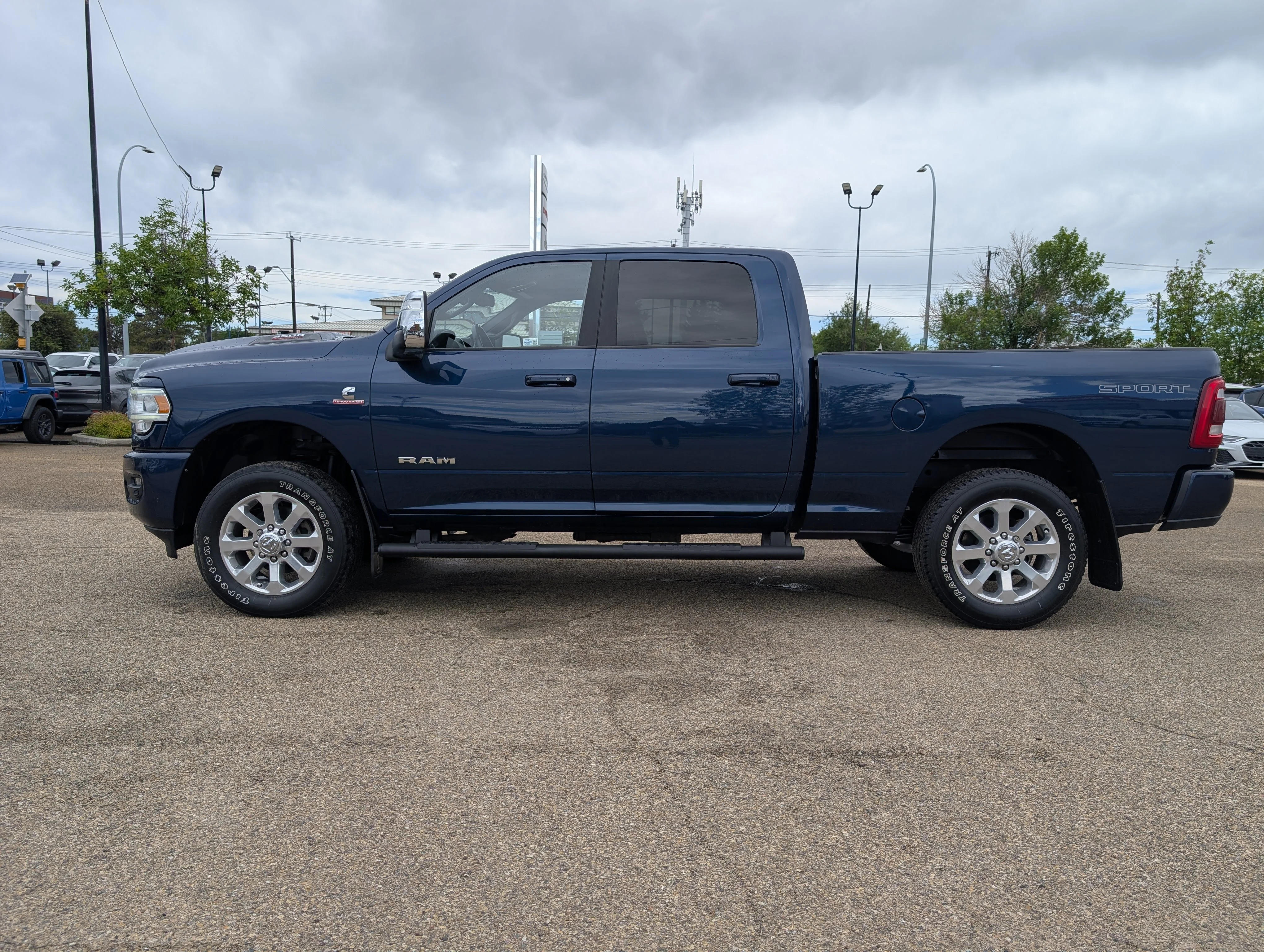 Used 2023 Patriot Blue Pearl Ram Laramie image 3