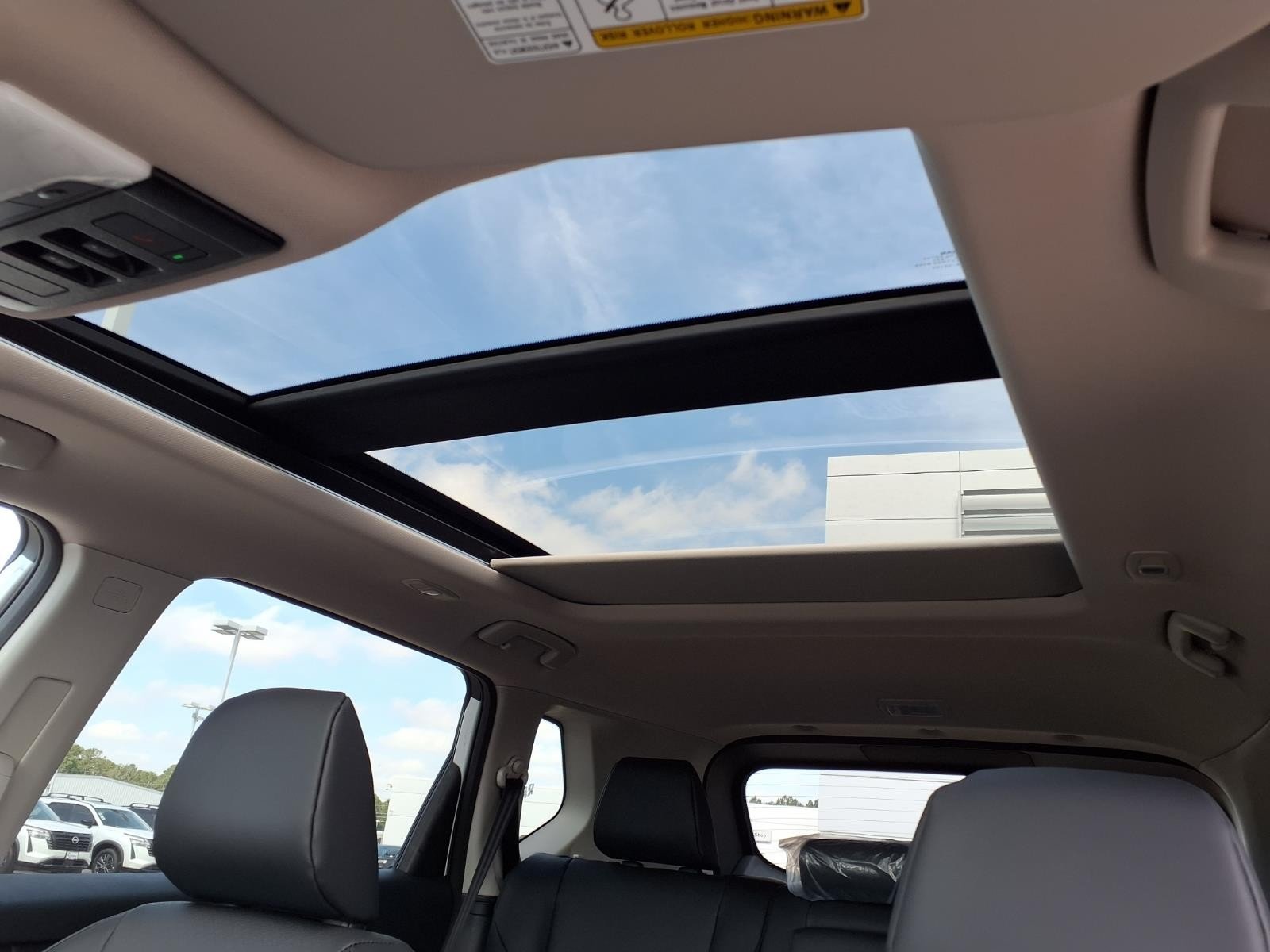 2026 Nissan Rogue Dark Armor™ White at Robbins Nissan