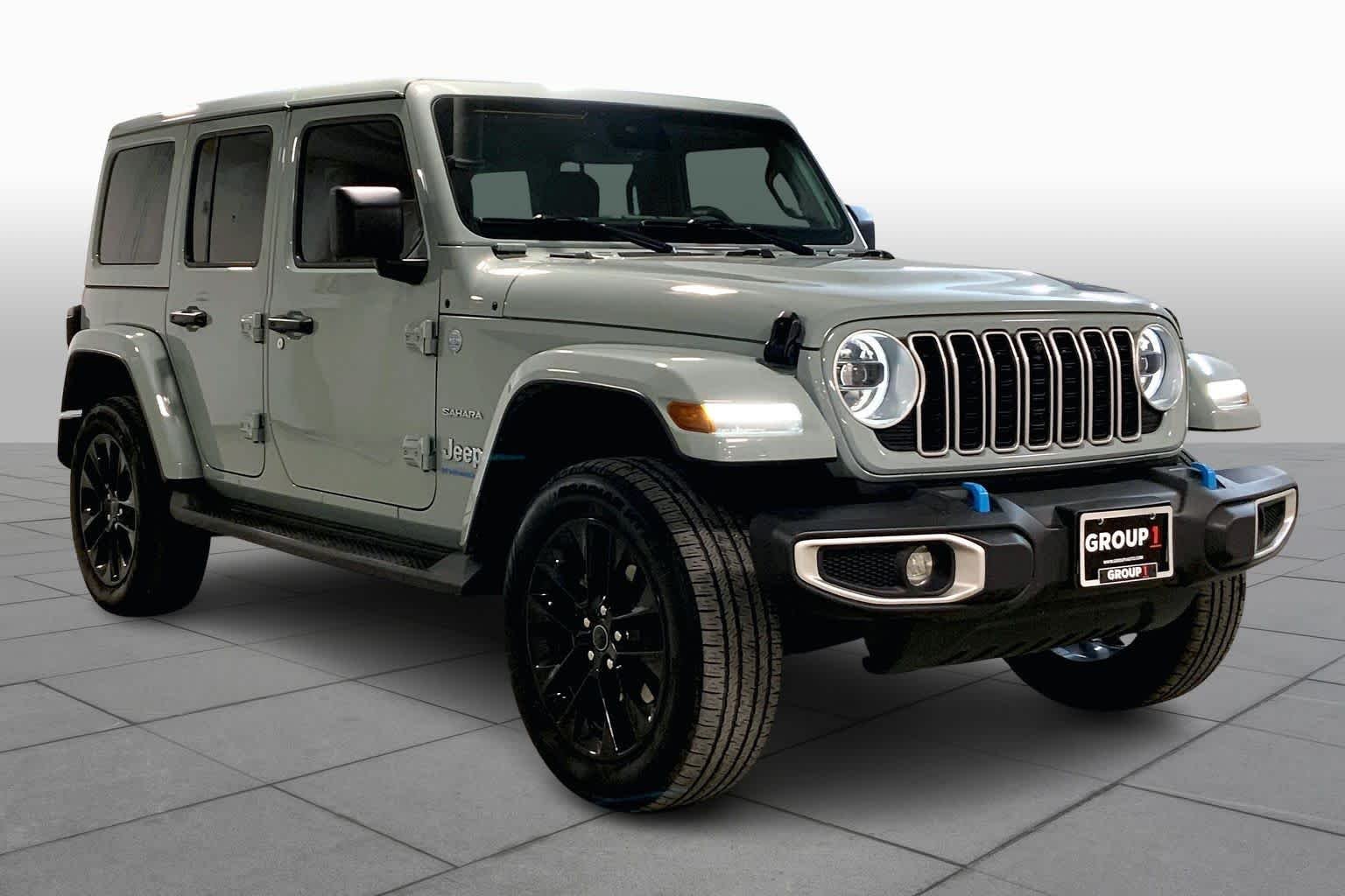 Used 2024 Jeep Wrangler 4xe Sahara 4XE with VIN 1C4RJXP65RW213477 for sale in Kansas City