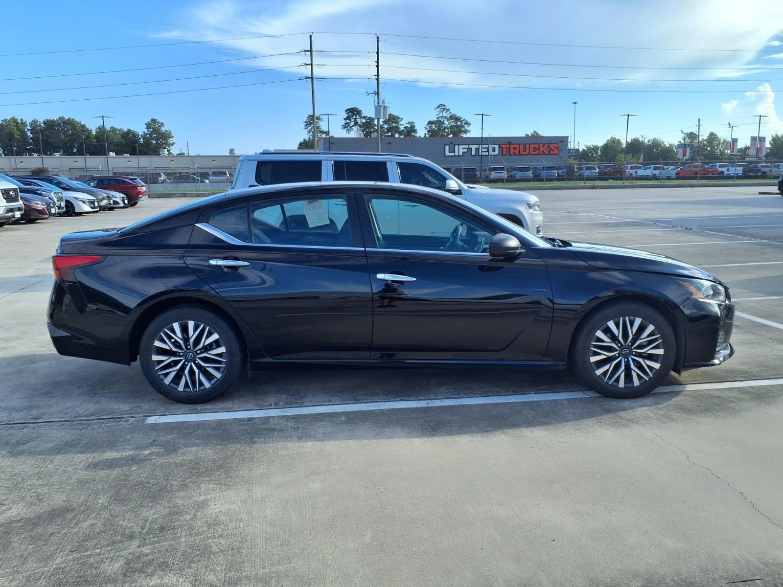 Used 2024 Super Black Nissan 2.5 SV image 11