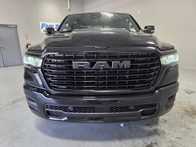 New 2026 Diamond Black Crystal Pearl-Coat Exterior Paint RAM Laramie image 2