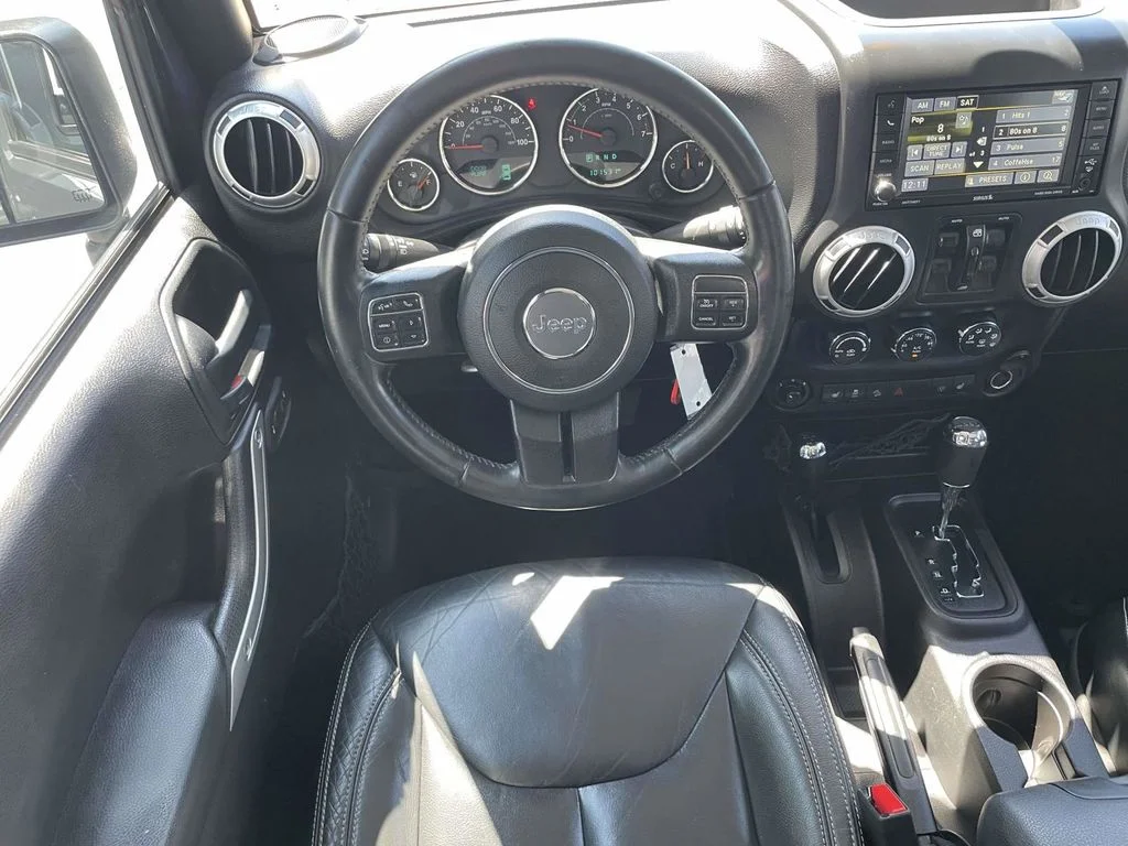 Used 2016 Black Jeep Unlimited Sahara image 21