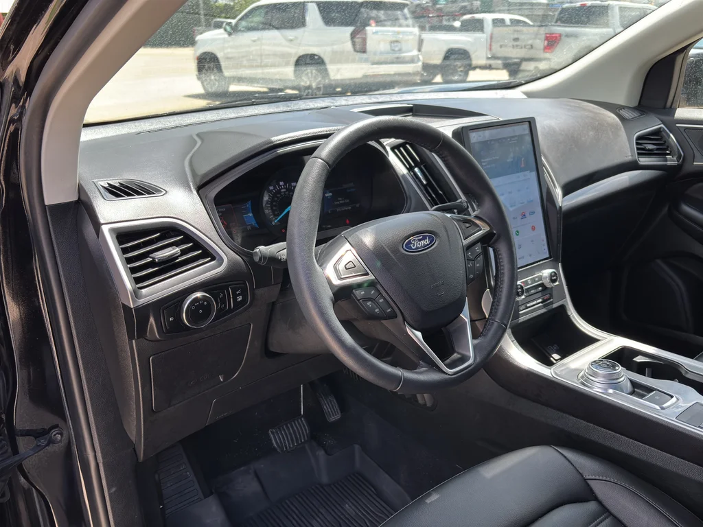 Used 2024 Agate Black Metallic Ford SEL image 10