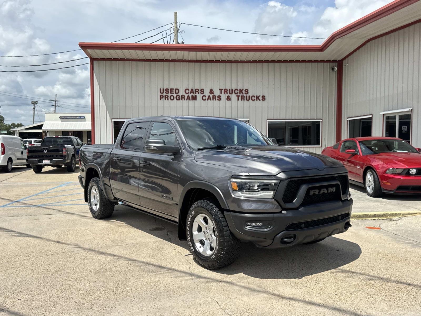 Used 2024 Granite Crystal Metallic Clearcoat Ram Rebel image 1