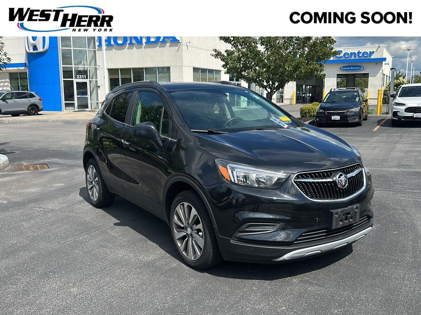 Used 2020 Ebony Twilight Metallic Buick Preferred image 1