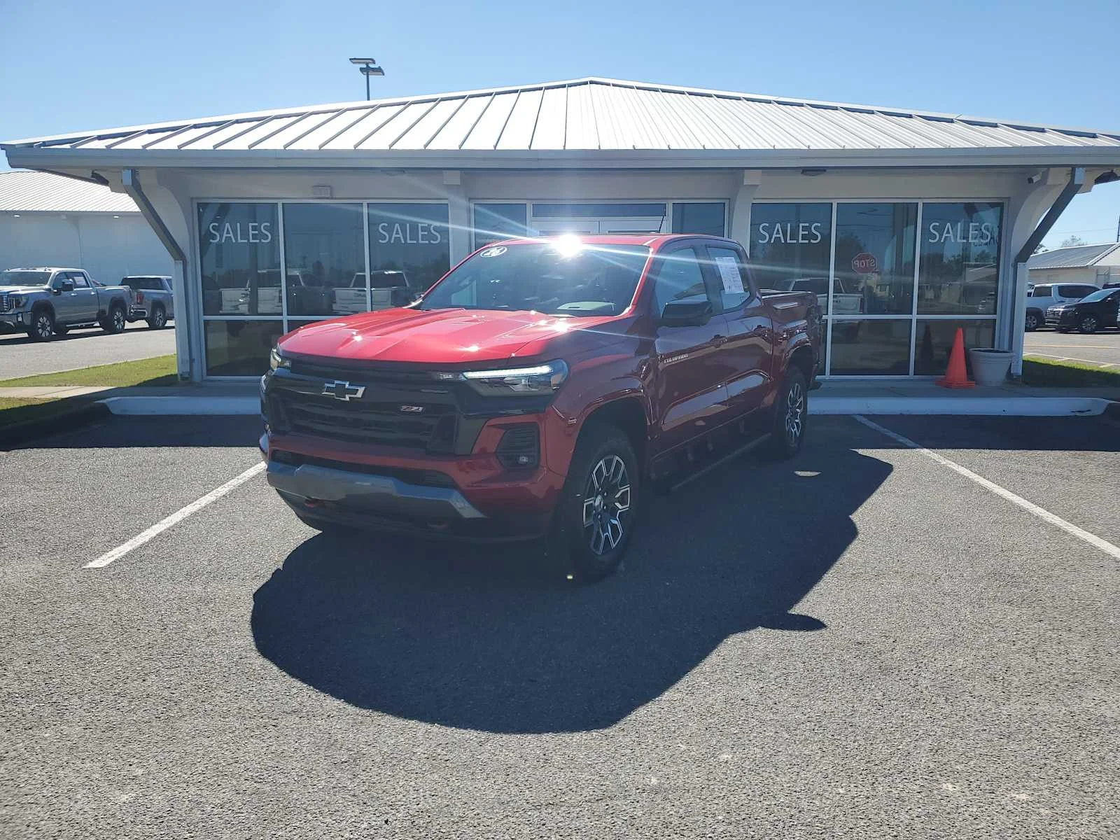 Used 2026 Radiant Red Tintcoat Chevrolet Z71 image 1