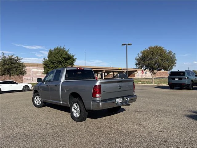 Used 2024 Granite Crystal Metallic Clearcoat RAM SLT 4x4 Quad Cab 6.3 ft. box 140 in. WB image 5