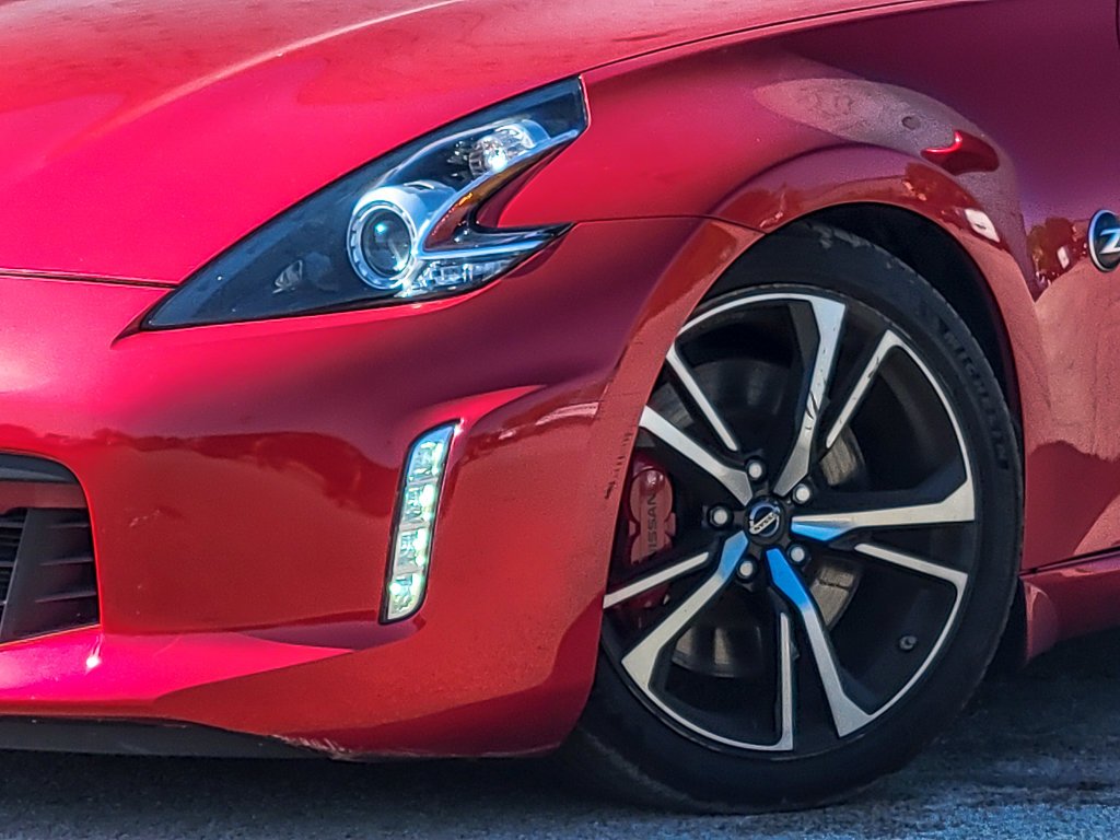 Used 2018 Passion Red Nissan Touring Sport image 5