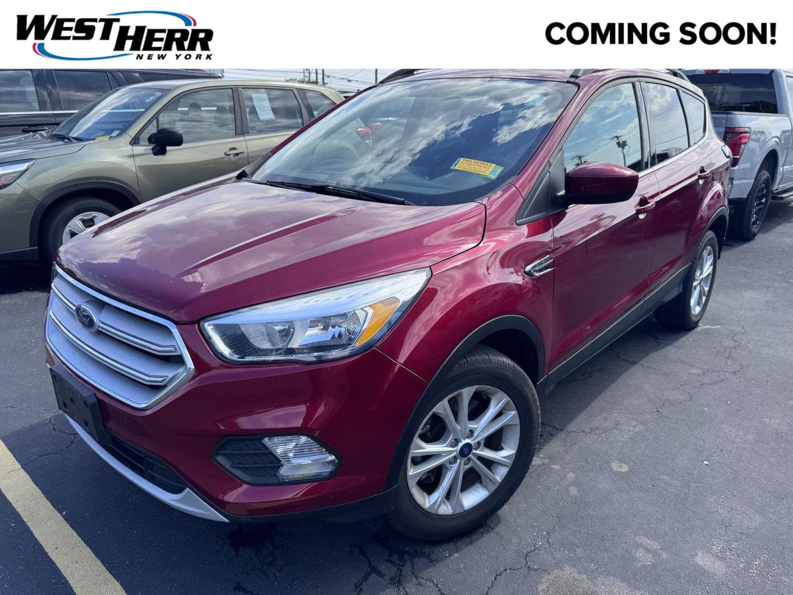 Used 2018 Ruby Red Metallic Tinted Clearcoat Ford SE image 1