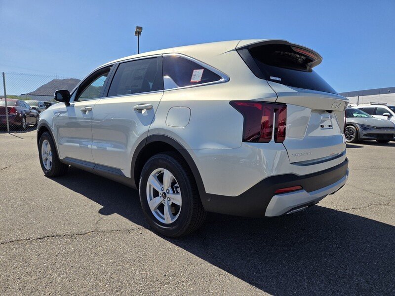 New 2026 Ivory Silver Kia LX image 4