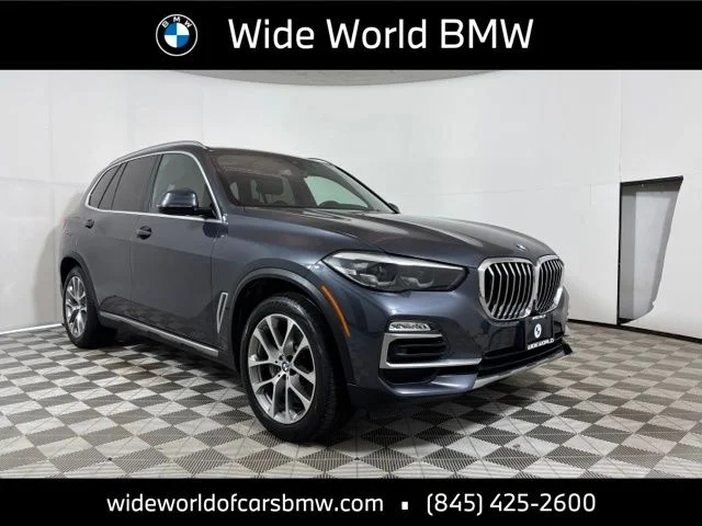 Used 2019 Gray BMW xDrive40i image 1