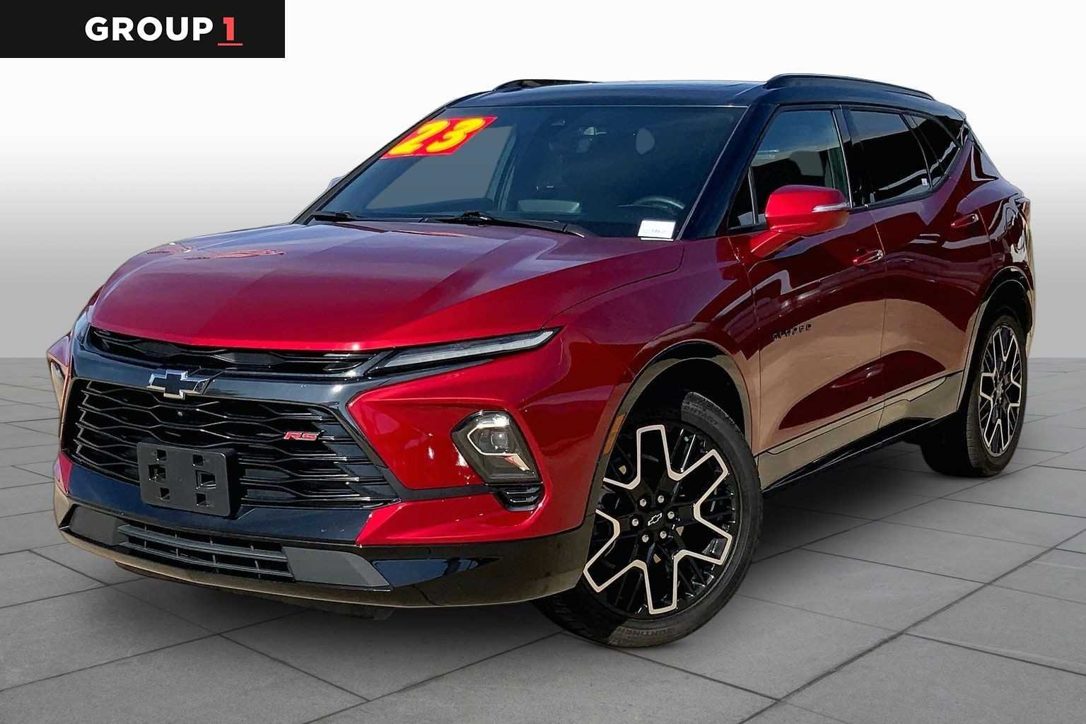 Used 2023 Radiant Red Tintcoat Chevrolet RS image 1