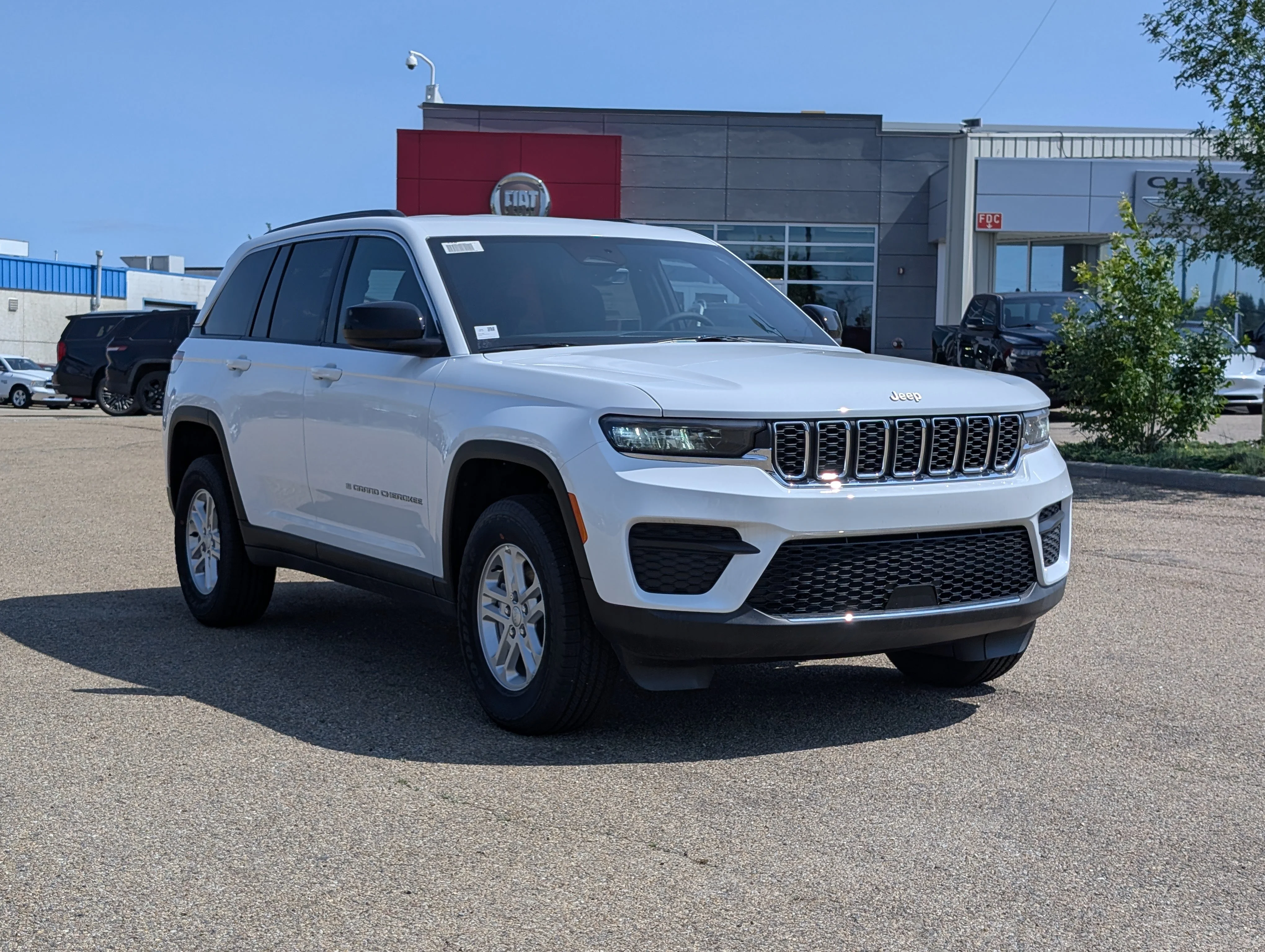 New 2025 Bright White Jeep Laredo image 9