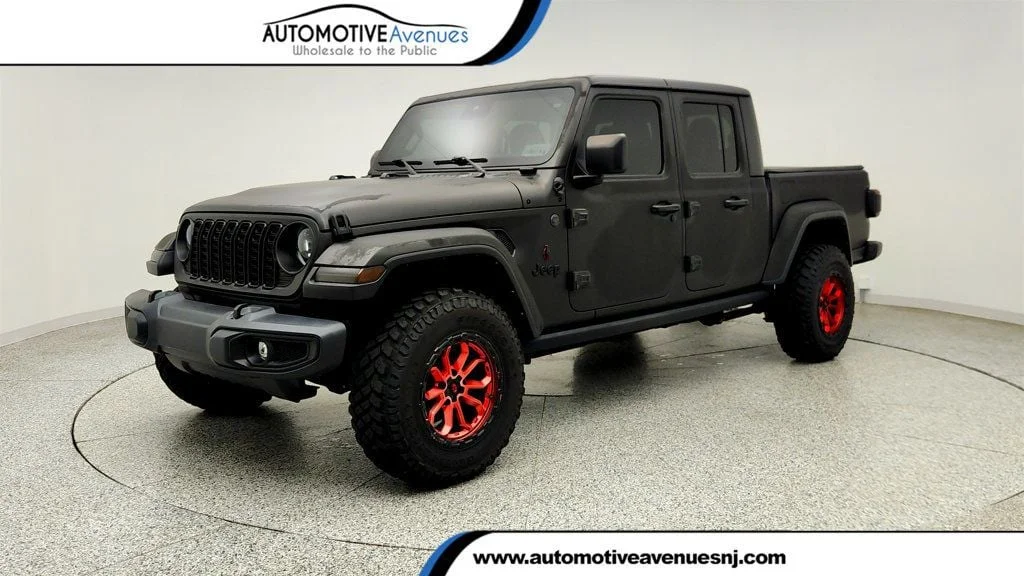 Used 2024 Black Clearcoat Jeep Willys 4x4 w/ Black Freedom Top & Trac-Lok Axle image 1