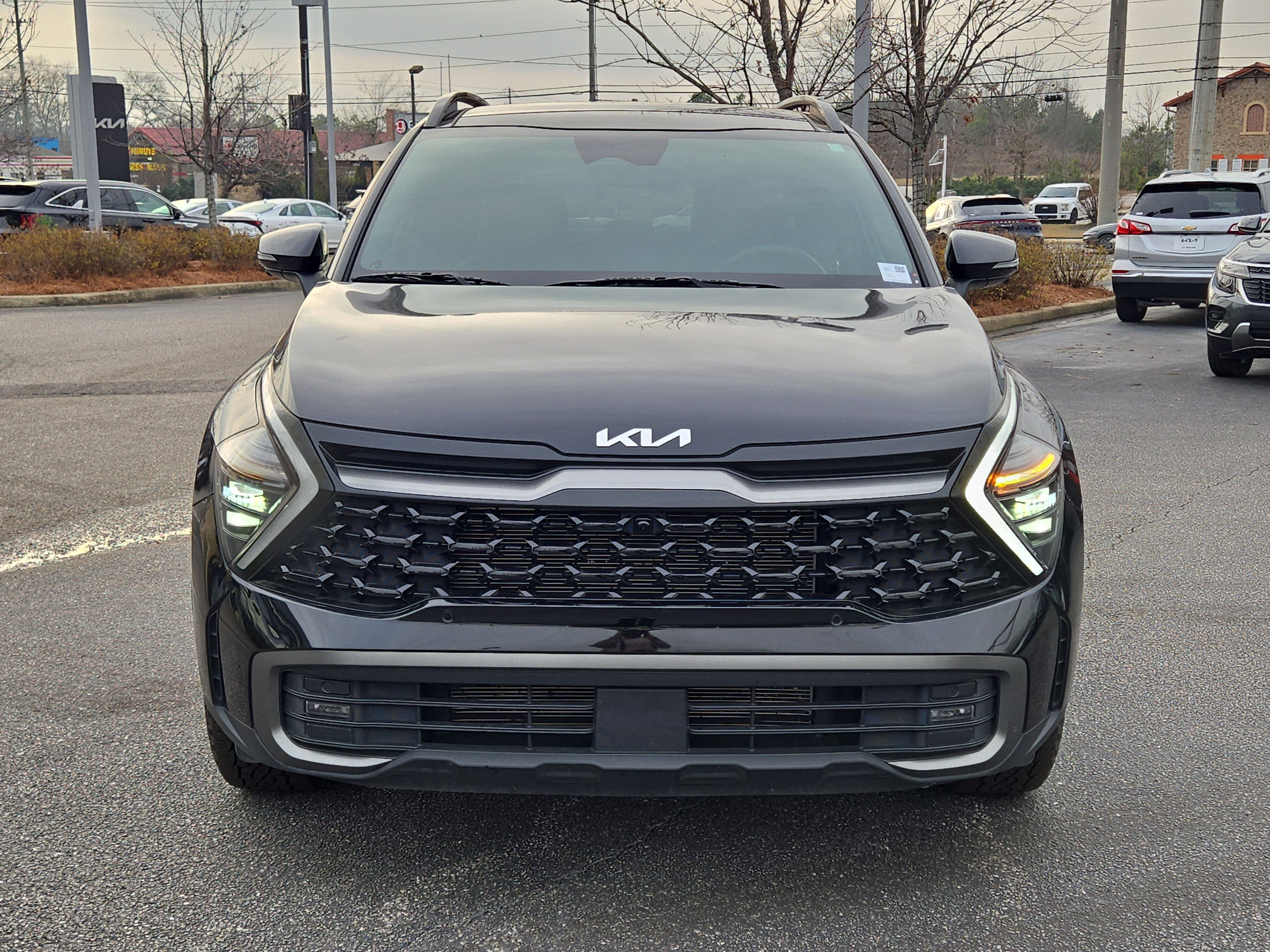 Used 2024 Ebony Black Kia X-Pro Prestige image 2