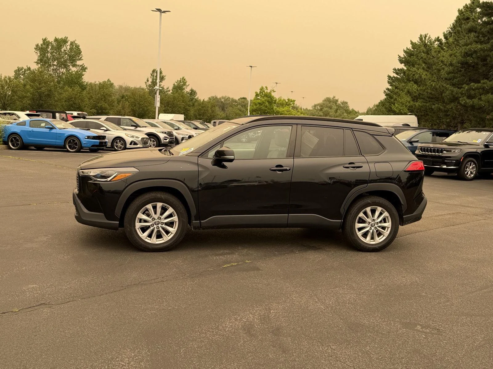 Used 2023 Jet Black Toyota LE image 6